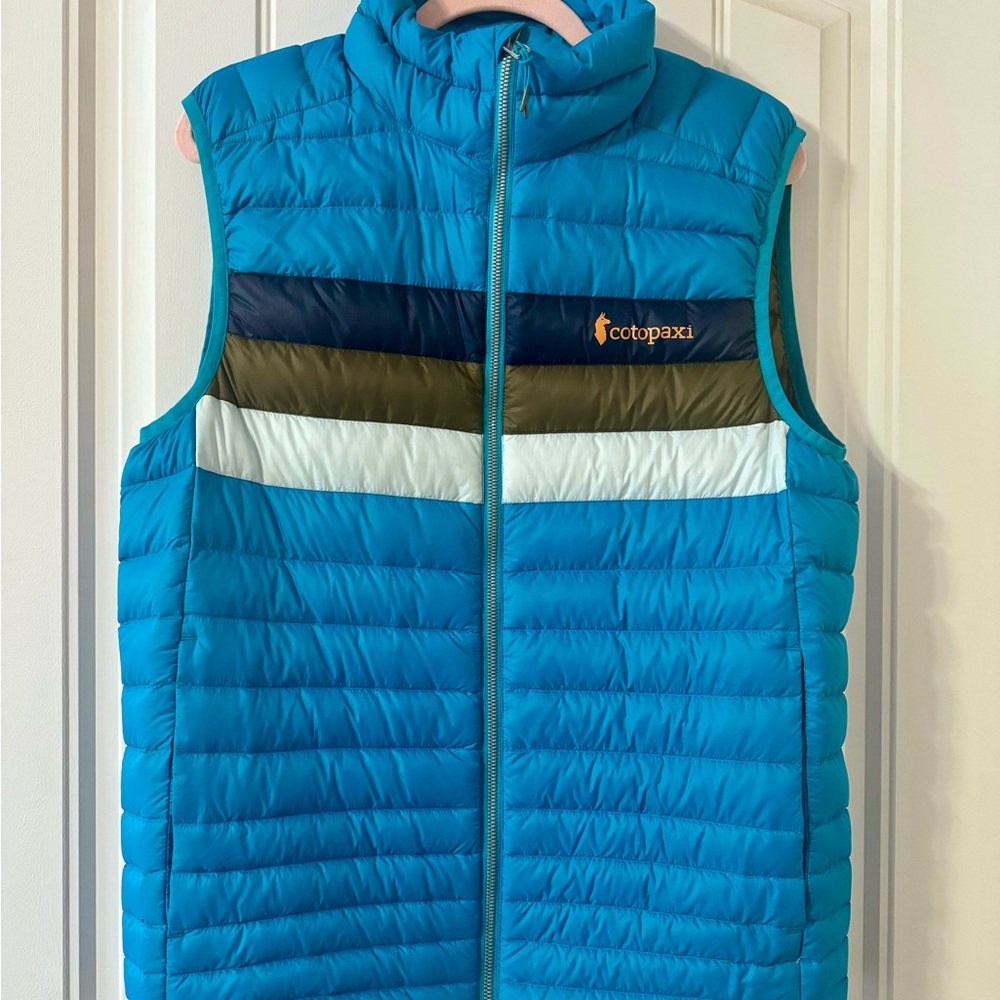 Cotopaxi Blue Puffer Vest with Color-Blocked Stripes
